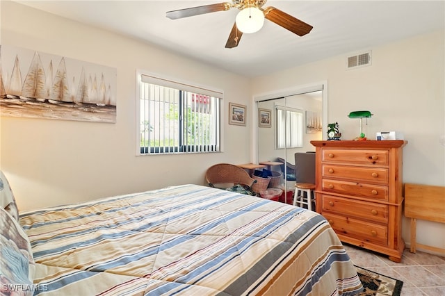 16000 Bay Pointe Blvd Unit 307, North Fort Myers, FL 33917 - bedroom featuring a closet, a ceiling fan, and light tile patterned floors