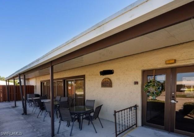 6300 S Pointe Blvd Unit 316, Fort Myers, FL 33919 - view of patio featuring outdoor dining area