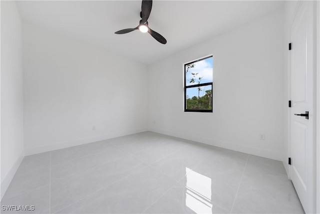 619 Greenbriar Blvd, Lehigh Acres, FL 33972 - unfurnished room featuring a ceiling fan, light tile patterned floors, and baseboards
