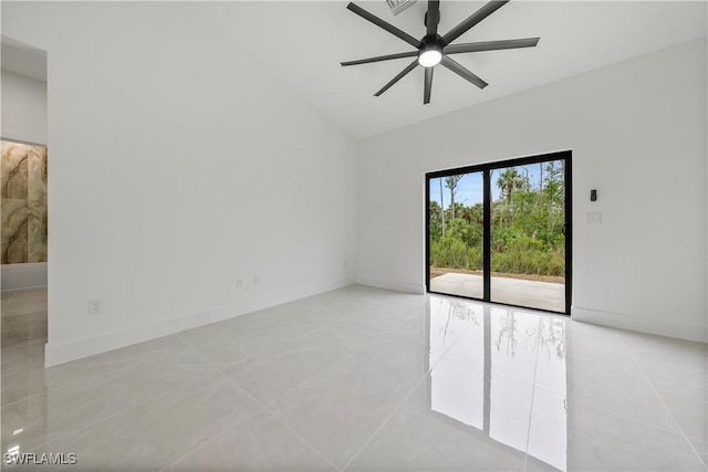619 Greenbriar Blvd, Lehigh Acres, FL 33972 - empty room featuring light tile patterned floors, ceiling fan, and lofted ceiling