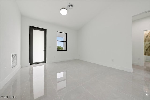 619 Greenbriar Blvd, Lehigh Acres, FL 33972 - unfurnished room with baseboards and light tile patterned floors