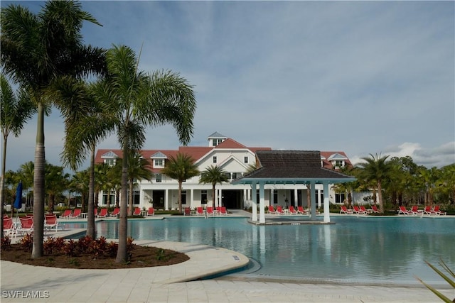 8881 Yucatan Ct, Naples, FL 34112 - community pool with a patio