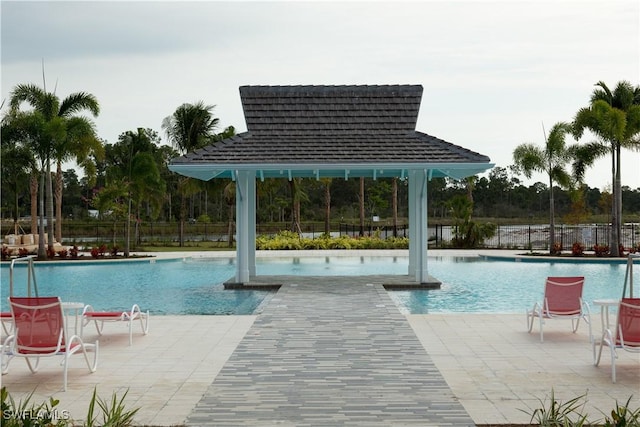 8881 Yucatan Ct, Naples, FL 34112 - community pool with a gazebo and fence