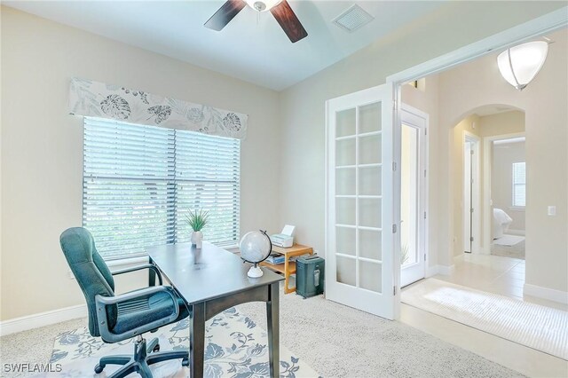 12490 Kentwood Ave, Fort Myers, FL 33913 - office area with arched walkways, a ceiling fan, and baseboards
