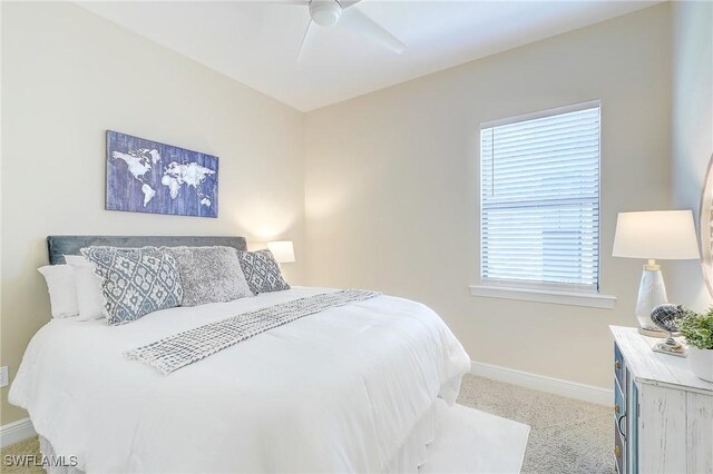 12490 Kentwood Ave, Fort Myers, FL 33913 - carpeted bedroom with baseboards and a ceiling fan