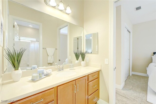 12490 Kentwood Ave, Fort Myers, FL 33913 - bathroom featuring vanity, toilet, and baseboards