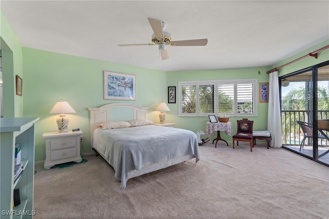 6979 Winkler Rd Unit 135, Fort Myers, FL 33919 - bedroom with access to exterior, carpet floors, and ceiling fan