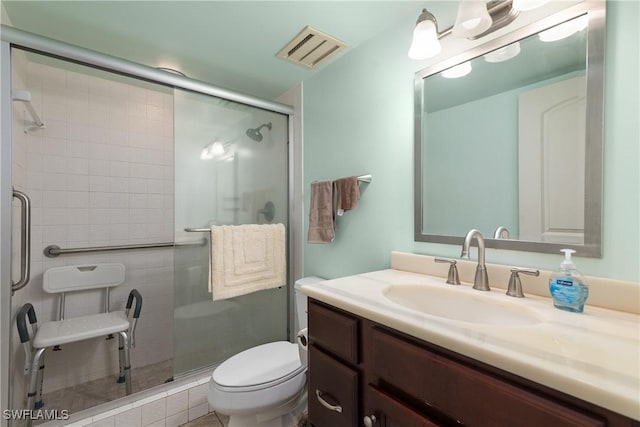 6979 Winkler Rd Unit 135, Fort Myers, FL 33919 - bathroom featuring vanity, toilet, and a stall shower