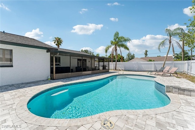 17365 Butler Rd, Fort Myers, FL 33967 - view of pool with a patio area, a fenced backyard, and a sunroom