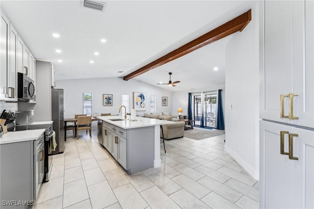 17365 Butler Rd, Fort Myers, FL 33967 - kitchen featuring stainless steel appliances, gray cabinetry, a sink, healthy amount of natural light, and recessed lighting