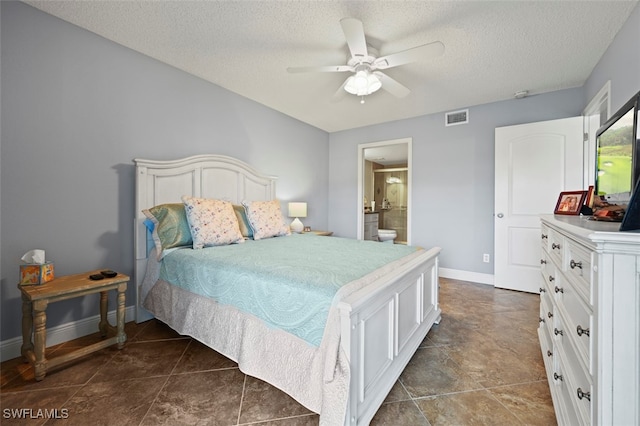 1210 Yesica Ann Cir Unit C105, Naples, FL 34110 - bedroom featuring baseboards, a textured ceiling, ceiling fan, and connected bathroom