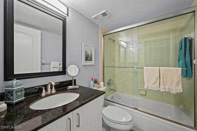 1210 Yesica Ann Cir Unit C105, Naples, FL 34110 - full bath with toilet, combined bath / shower with glass door, and vanity