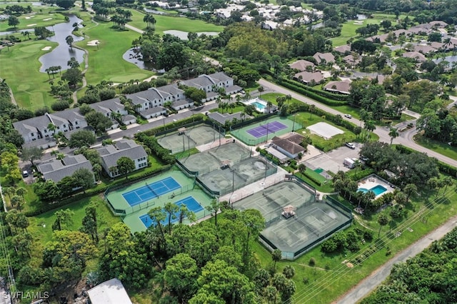 1210 Yesica Ann Cir Unit C105, Naples, FL 34110 - aerial overview of property's location featuring nearby suburban area, a large body of water, and a golf course