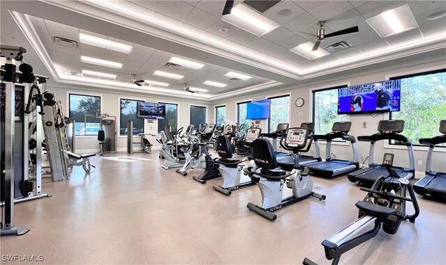 8736 Naples Heritage Dr, Naples, FL 34112 - gym featuring a raised ceiling, a drop ceiling, and crown molding