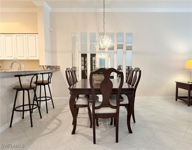 8736 Naples Heritage Dr, Naples, FL 34112 - dining room with a chandelier, ornamental molding, baseboards, and light tile patterned flooring