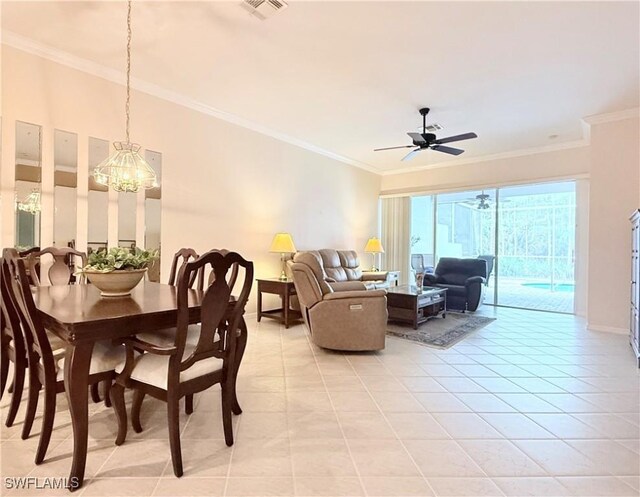 8736 Naples Heritage Dr, Naples, FL 34112 - dining space featuring a chandelier, ornamental molding, light tile patterned floors, and ceiling fan
