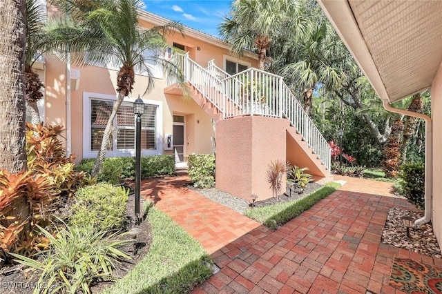2365 Hidden Lake Dr Unit 4309, Naples, FL 34112 - view of patio / terrace featuring stairway