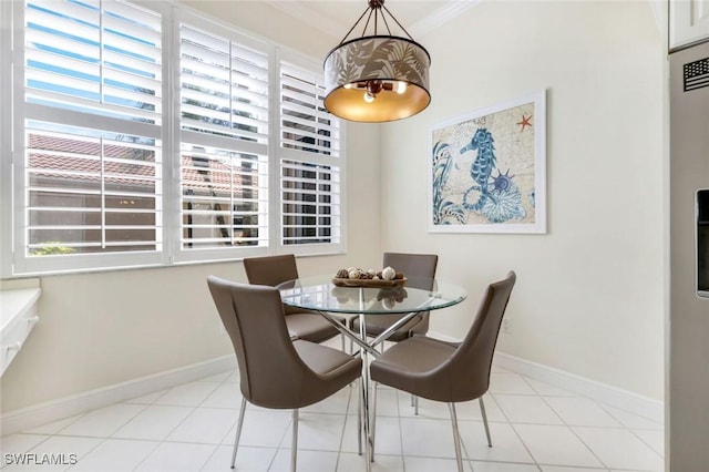 2365 Hidden Lake Dr Unit 4309, Naples, FL 34112 - dining room featuring plenty of natural light, baseboards, and tile patterned floors
