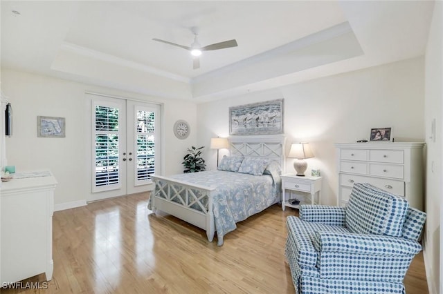 2365 Hidden Lake Dr Unit 4309, Naples, FL 34112 - bedroom with a tray ceiling, access to outside, light wood-style floors, french doors, and a ceiling fan