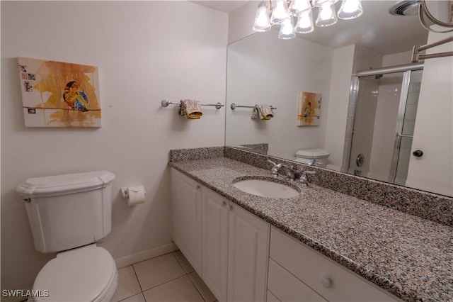 7150 Estero Blvd Unit 403, Fort Myers Beach, FL 33931 - bathroom with toilet, vanity, a tile shower, tile patterned flooring, and baseboards