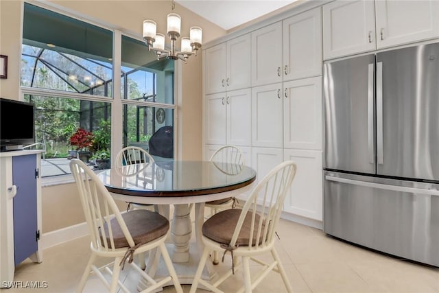 16712 Gilroy St, Bonita Springs, FL 34135 - dining space with a chandelier and light tile patterned floors