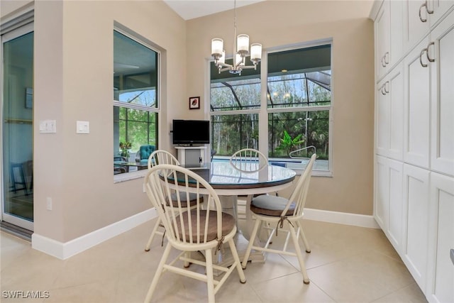 16712 Gilroy St, Bonita Springs, FL 34135 - dining room featuring a chandelier, baseboards, and light tile patterned flooring