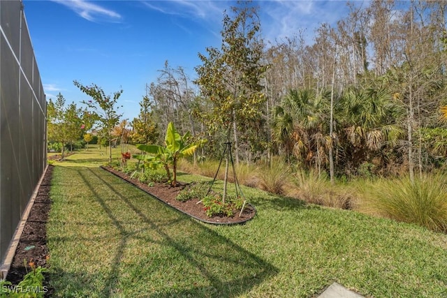 16712 Gilroy St, Bonita Springs, FL 34135 - view of green lawn featuring a lanai