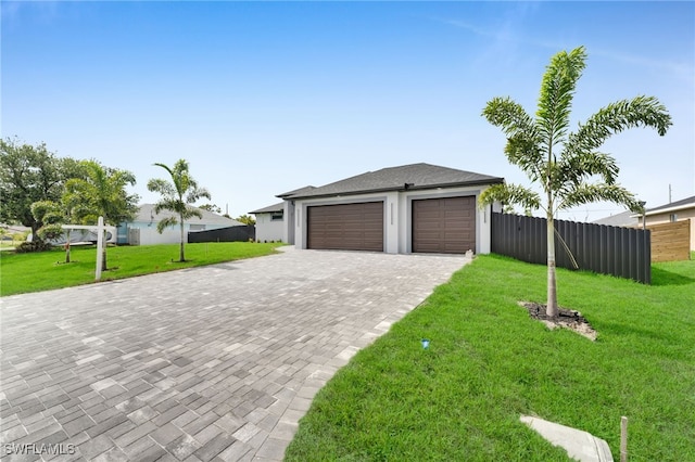 336 NE 25th St, Cape Coral, FL 33909 - garage with decorative driveway
