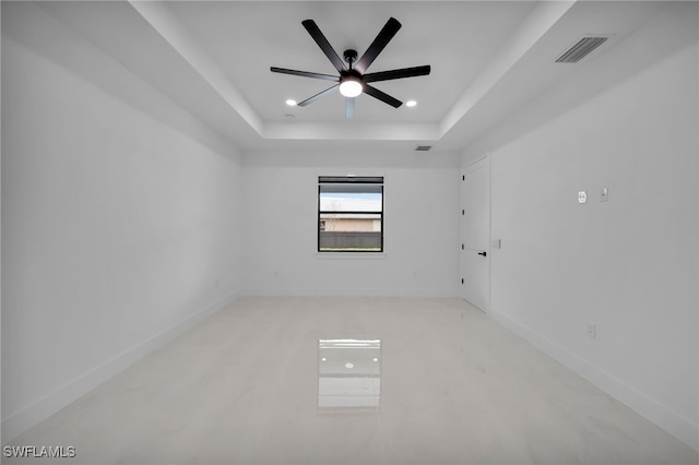 336 NE 25th St, Cape Coral, FL 33909 - spare room with a raised ceiling, recessed lighting, ceiling fan, and baseboards