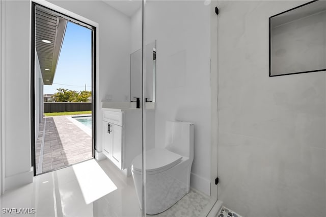 336 NE 25th St, Cape Coral, FL 33909 - full bath with healthy amount of natural light, toilet, a stall shower, and vanity