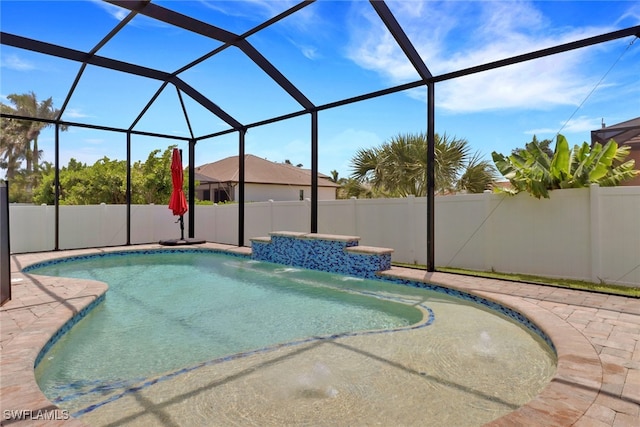 2510 SW 24th Ct, Cape Coral, FL 33914 - view of swimming pool featuring a patio and glass enclosure