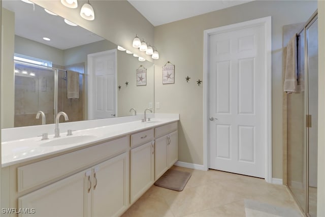 2510 SW 24th Ct, Cape Coral, FL 33914 - full bath with double vanity, a shower stall, tile patterned flooring, and baseboards