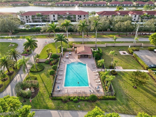 6670 Huntington Lakes Cir Unit 104, Naples, FL 34119 - bird's eye view of a pool area and a large body of water