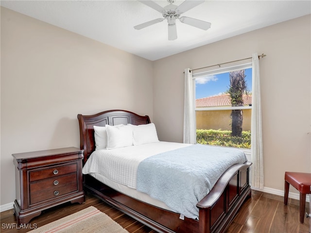 6670 Huntington Lakes Cir Unit 104, Naples, FL 34119 - bedroom featuring baseboards, dark wood-style floors, and ceiling fan