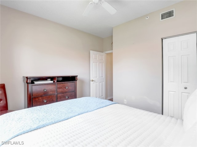 6670 Huntington Lakes Cir Unit 104, Naples, FL 34119 - bedroom with a closet and ceiling fan
