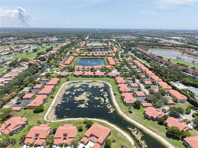 6670 Huntington Lakes Cir Unit 104, Naples, FL 34119 - aerial view of property's location featuring a large body of water and nearby suburban area