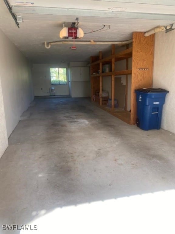 5015 Harbortown Ln Unit 204, Fort Myers, FL 33919 - garage with a garage door opener