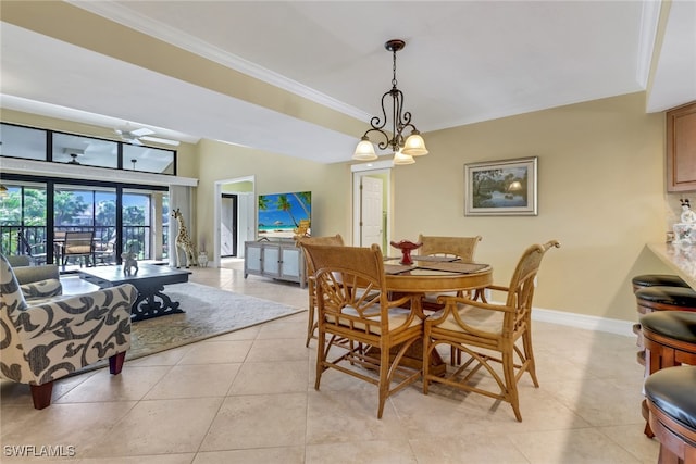 5015 Harbortown Ln Unit 204, Fort Myers, FL 33919 - dining room featuring light tile patterned flooring, crown molding, and baseboards