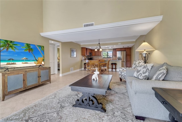 5015 Harbortown Ln Unit 204, Fort Myers, FL 33919 - living room with light tile patterned floors, baseboards, and recessed lighting