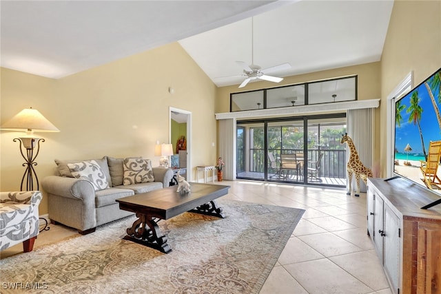5015 Harbortown Ln Unit 204, Fort Myers, FL 33919 - living room with high vaulted ceiling, light tile patterned flooring, and a ceiling fan