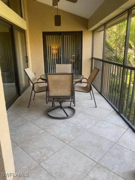 5015 Harbortown Ln Unit 204, Fort Myers, FL 33919 - sunroom with lofted ceiling and ceiling fan
