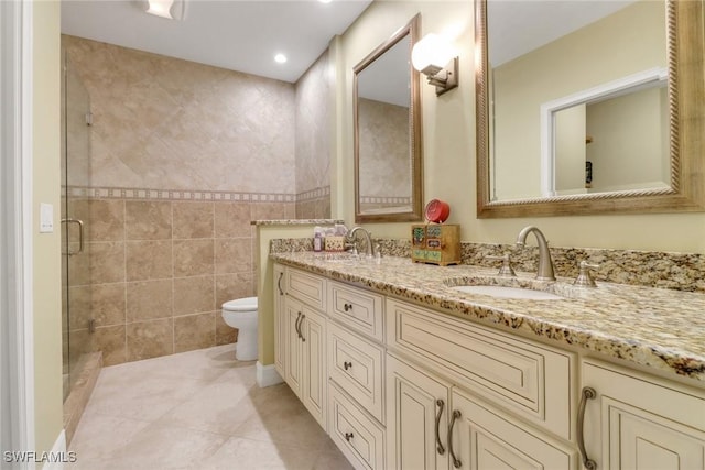5015 Harbortown Ln Unit 204, Fort Myers, FL 33919 - full bath featuring a stall shower, toilet, double vanity, tile patterned flooring, and recessed lighting