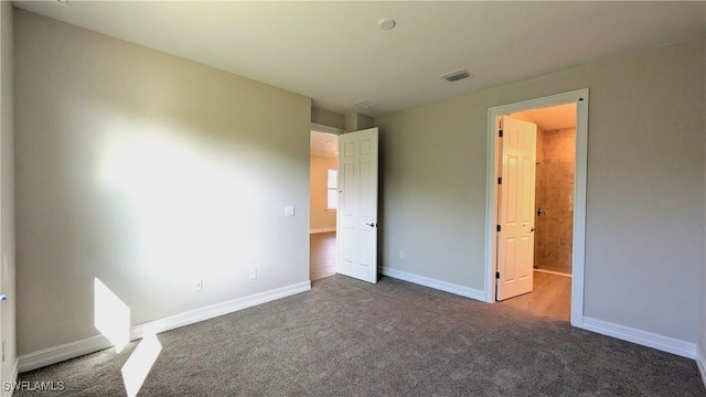 986 Enbrook Loop, Naples, FL 34114 - unfurnished bedroom with carpet and baseboards