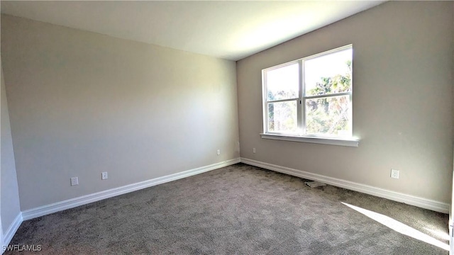 986 Enbrook Loop, Naples, FL 34114 - carpeted empty room featuring baseboards