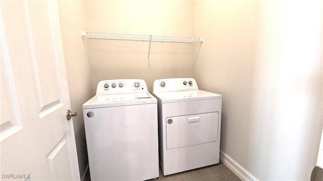 986 Enbrook Loop, Naples, FL 34114 - washroom with independent washer and dryer and baseboards