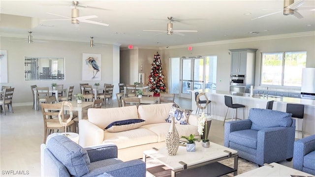986 Enbrook Loop, Naples, FL 34114 - living area featuring ceiling fan, ornamental molding, and baseboards