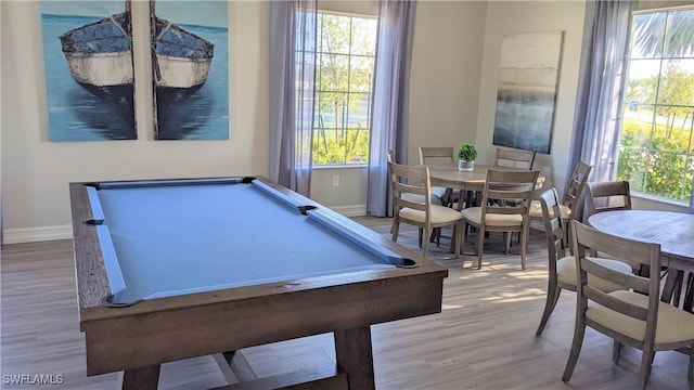 986 Enbrook Loop, Naples, FL 34114 - recreation room with baseboards, wood finished floors, and plenty of natural light