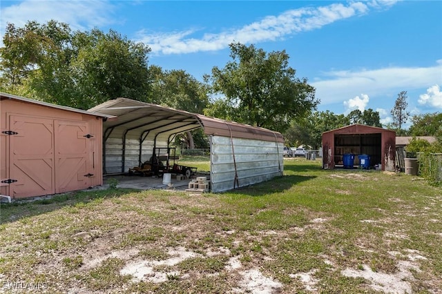 7384 Coon Rd, North Fort Myers, FL 33917 - view of car parking with a detached carport and a storage unit