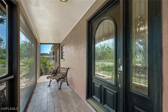 7384 Coon Rd, North Fort Myers, FL 33917 - entrance to property featuring stucco siding