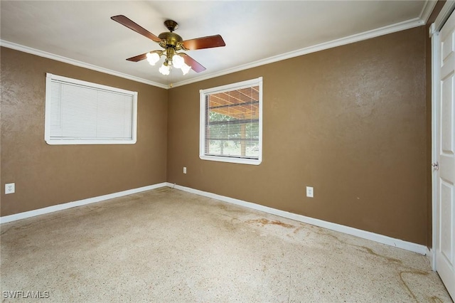 7384 Coon Rd, North Fort Myers, FL 33917 - spare room with a ceiling fan, ornamental molding, baseboards, and speckle patterned floor